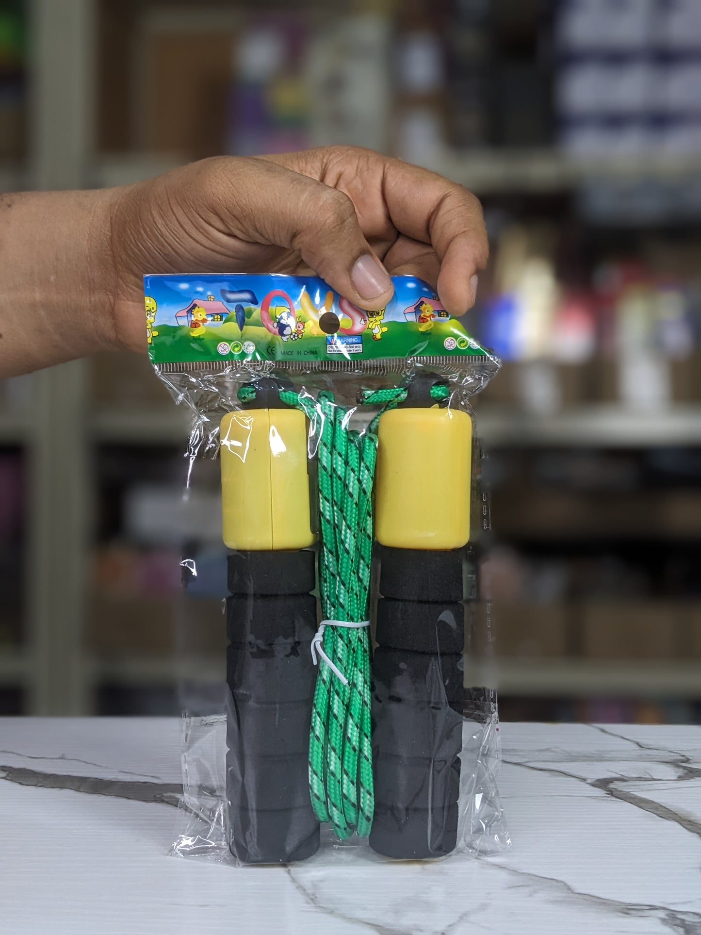 Skipping rope with padded hand and counter