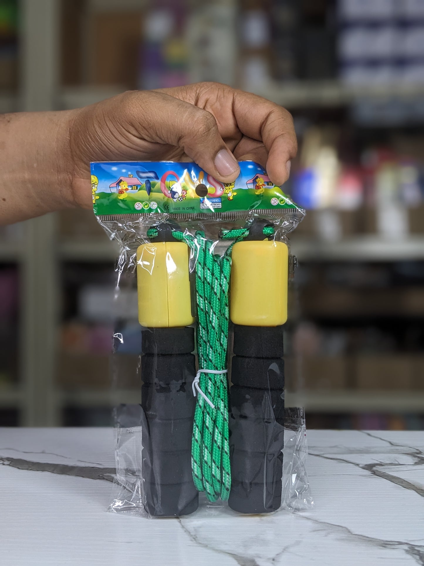 Skipping rope with padded hand and counter