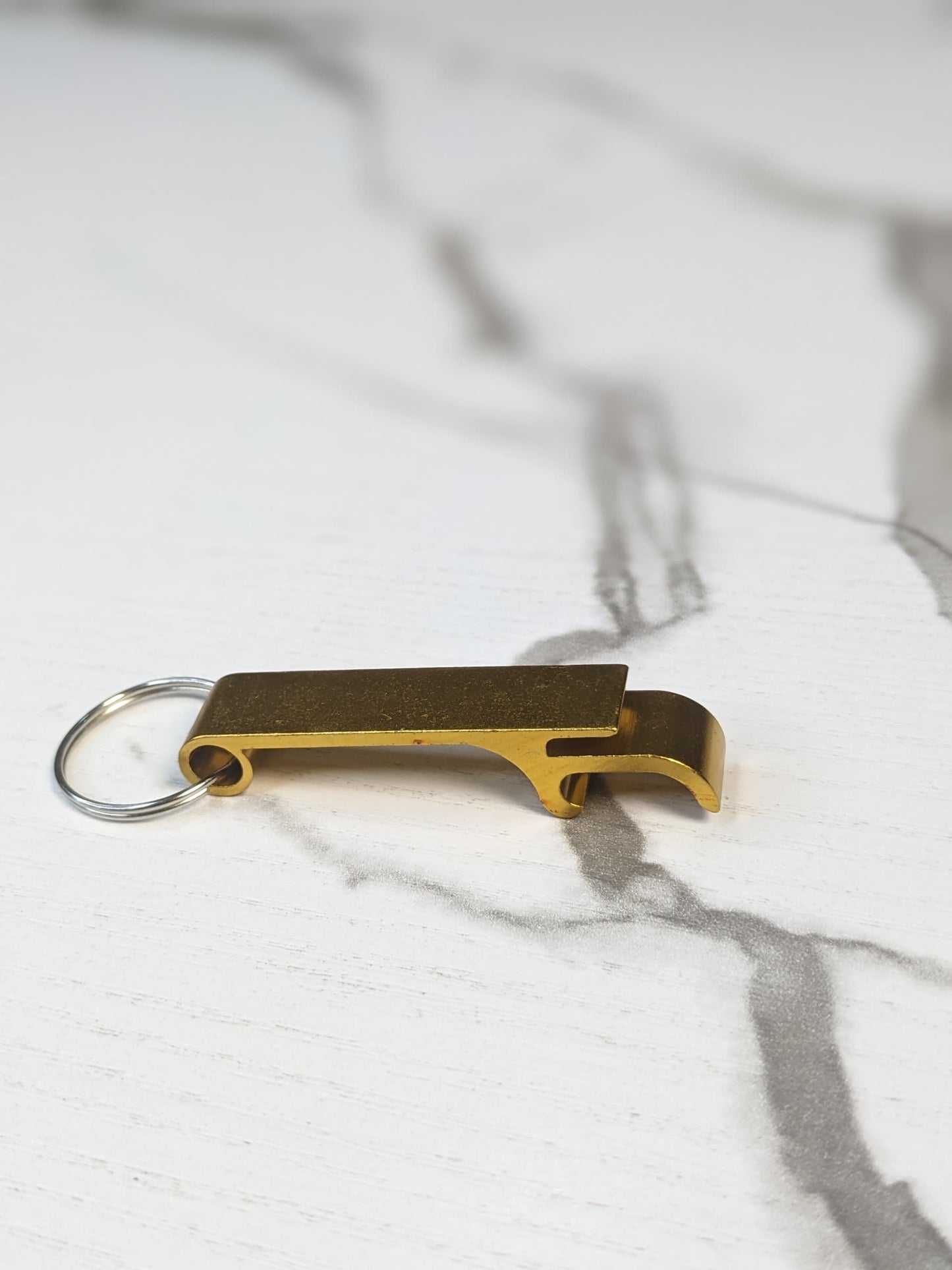 Metal beer bottle opener keychain