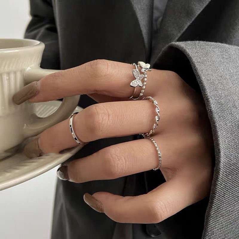 Double butterfly ring set of 4 knuckle ring