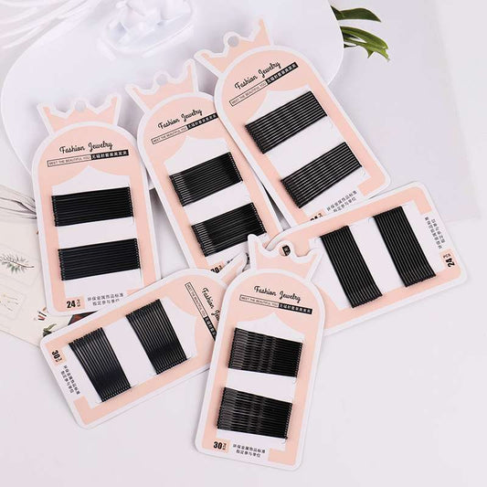 A pink pack wavy clip Bobby pin